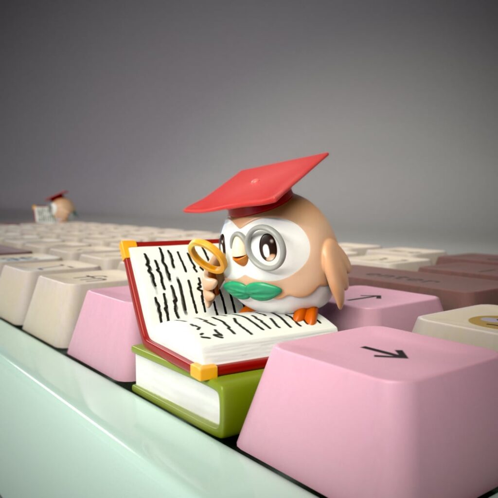 Bring knowledge to your keyboard setup! 📚✨
This adorable Rowlet-inspired scholar is captured in a charming moment—wearing a graduation cap, glasses, and deeply focused on reading a book. Perfect blend of cute + smart + collectible for any keyboard lover or Pokémon fan.