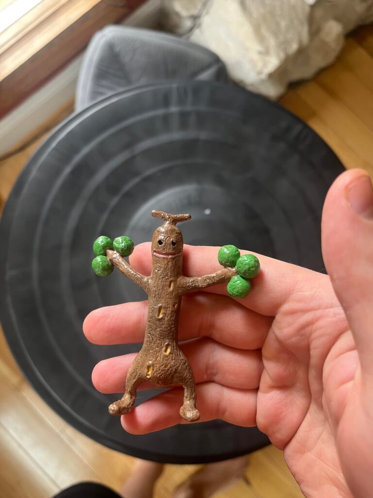 Making a Sudowoodo from some flexible clay.
