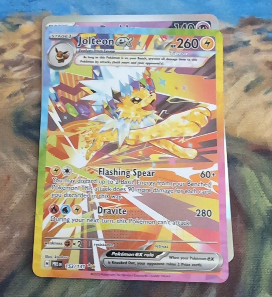 It only took me like 220ish packs, but. I finally pulled an Eeveelution