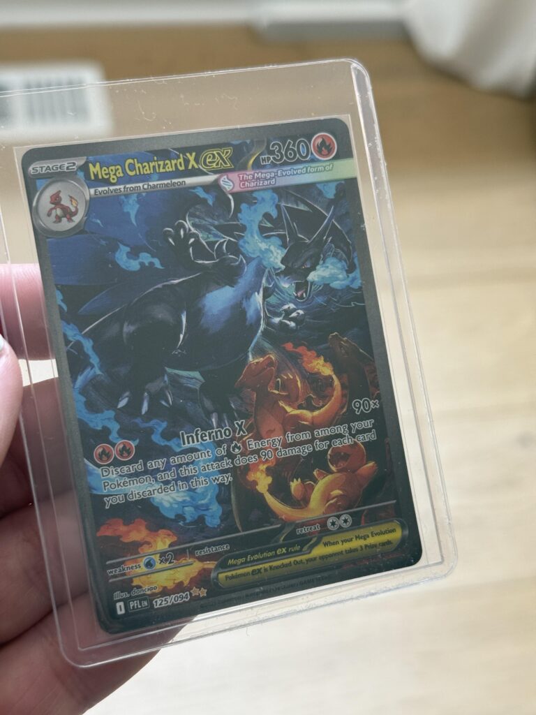 My daughter traded a Sylveon EX for the Mega Charizard SIR