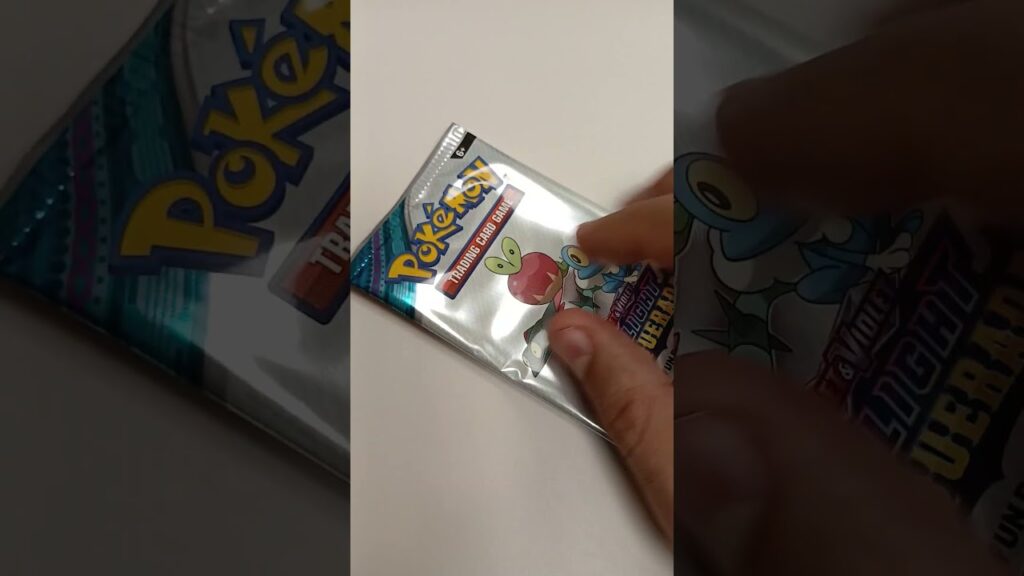 Should I open it or Keep it sealed  #pokemon #pokemonchannel #pokemonboosterpacks #vstaruniverse