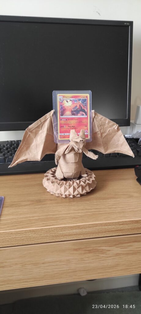 My origami charizard card holder!