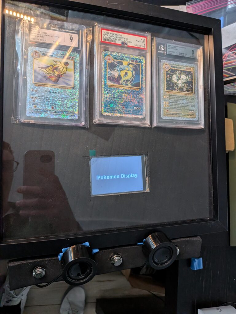 I tried building a "Museum-Style" display for my favorite cards that plays Pokédex entries...