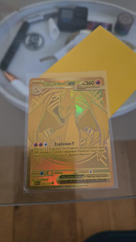 FIRST BOOSTER BUNDLE - MEGA HYPER RARE CHARIZARD