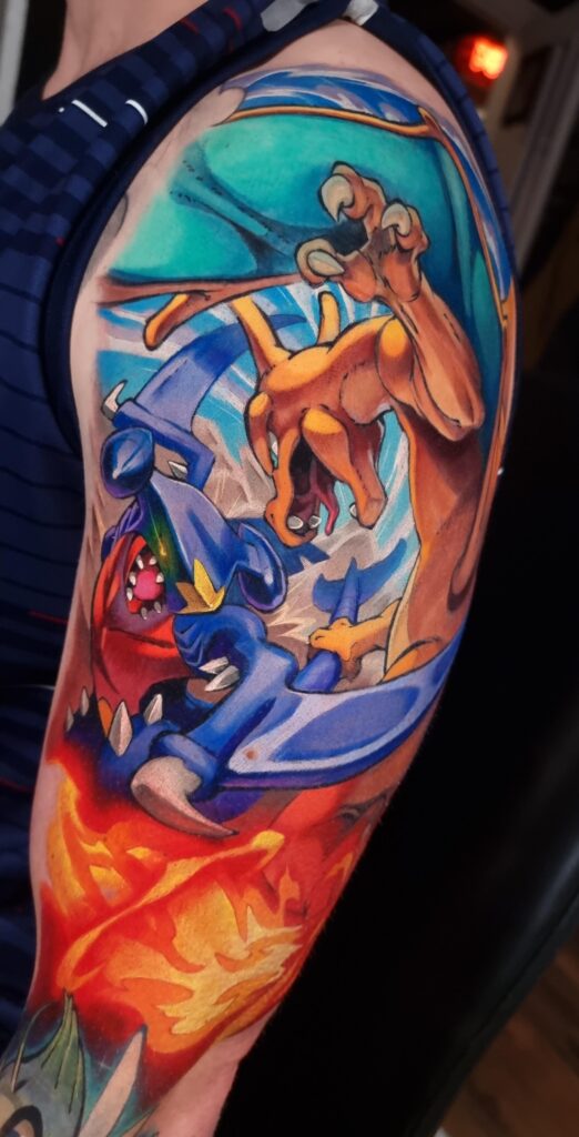 Garchomp vs. Charizard tattoo!