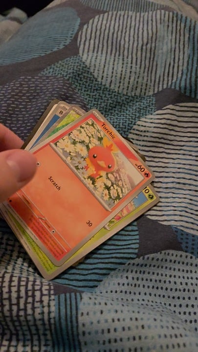 I know nothing about pokemon but today i rated the ones i opened by cuteness they shall now be stuck in a scrap book well some anyways