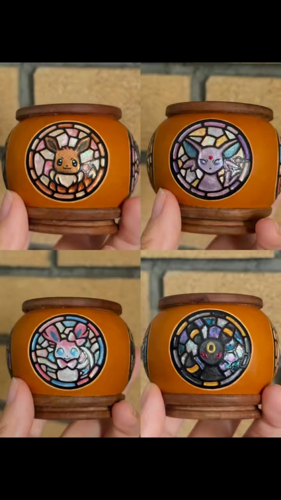 I made this hand-carved Eevee gourd jar inlaid with shining mother-of-pearl shells! ✨ (Featuring Espeon, Umbreon, & Sylveon too!)