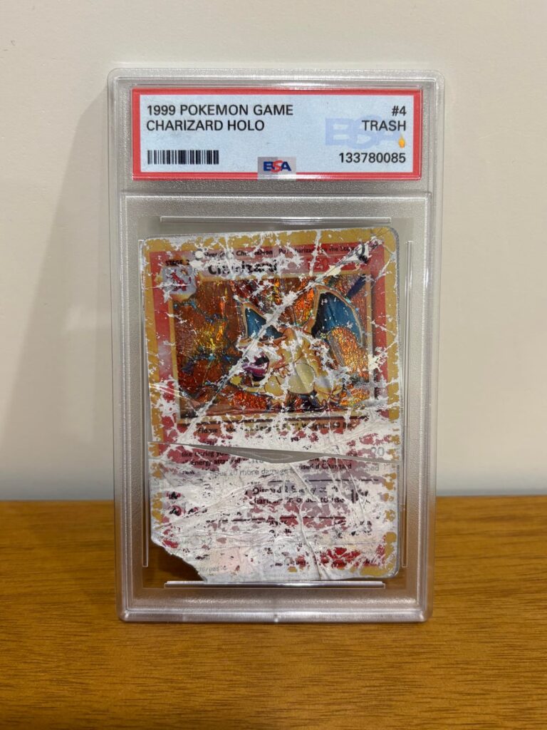 My childhood Charizard just got back from Grading!!