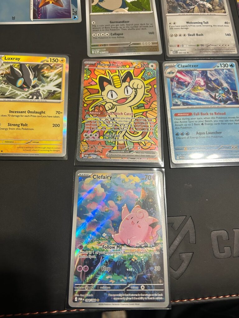 Couple of recent pulls + GameStop Promo Swirl 🌀