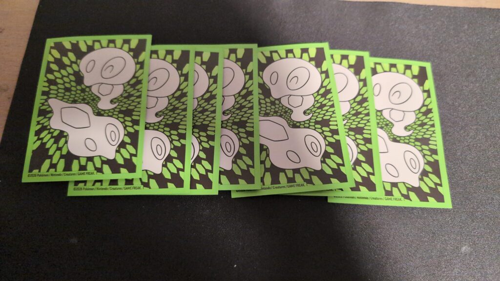 Did anybody else's po etb come with an extra card sleeve?