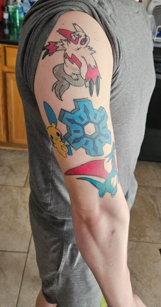 I got tattoos of my three favorite Pokémon, Minun, Salamence, and Zangoose!