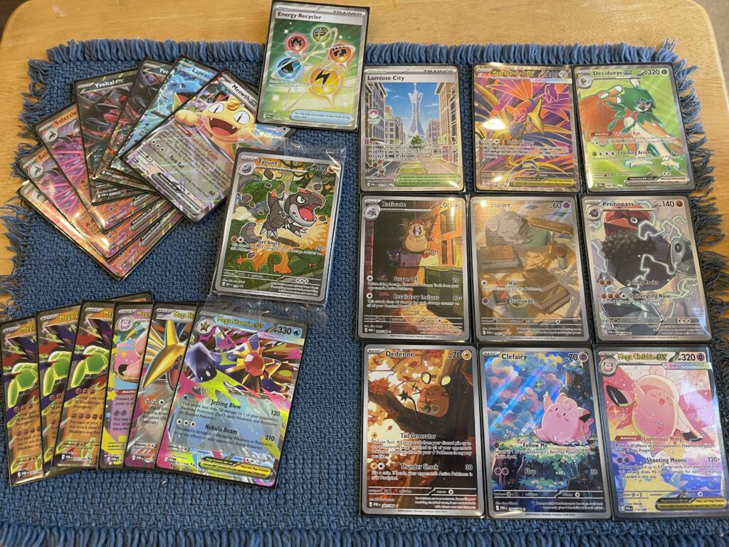 My gf and I’s hits on one PO booster box + one PO ETB. So nice to finally be able to occasionally find stuff for msrp with this set.