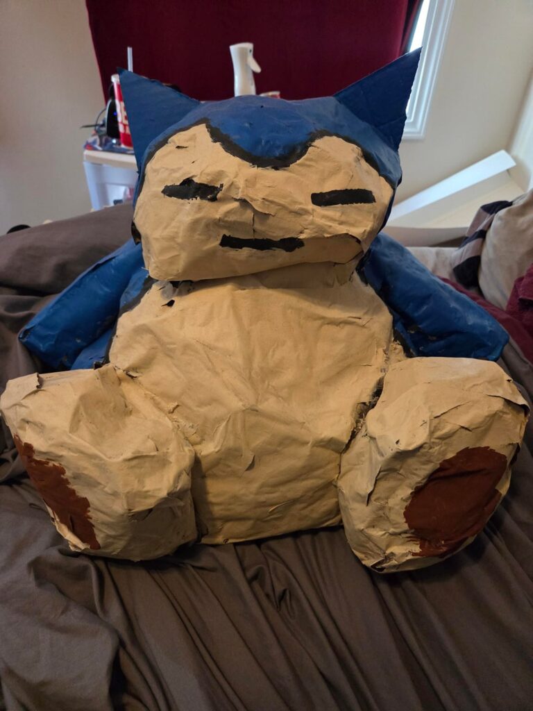 A while ago I made a Snorlax paper mache hat
