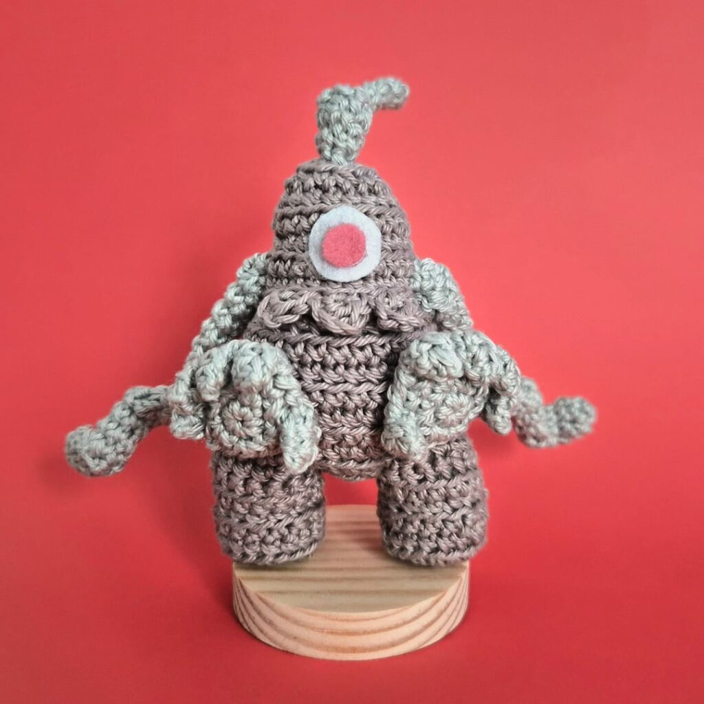 I crocheted a tiny Dusclops!