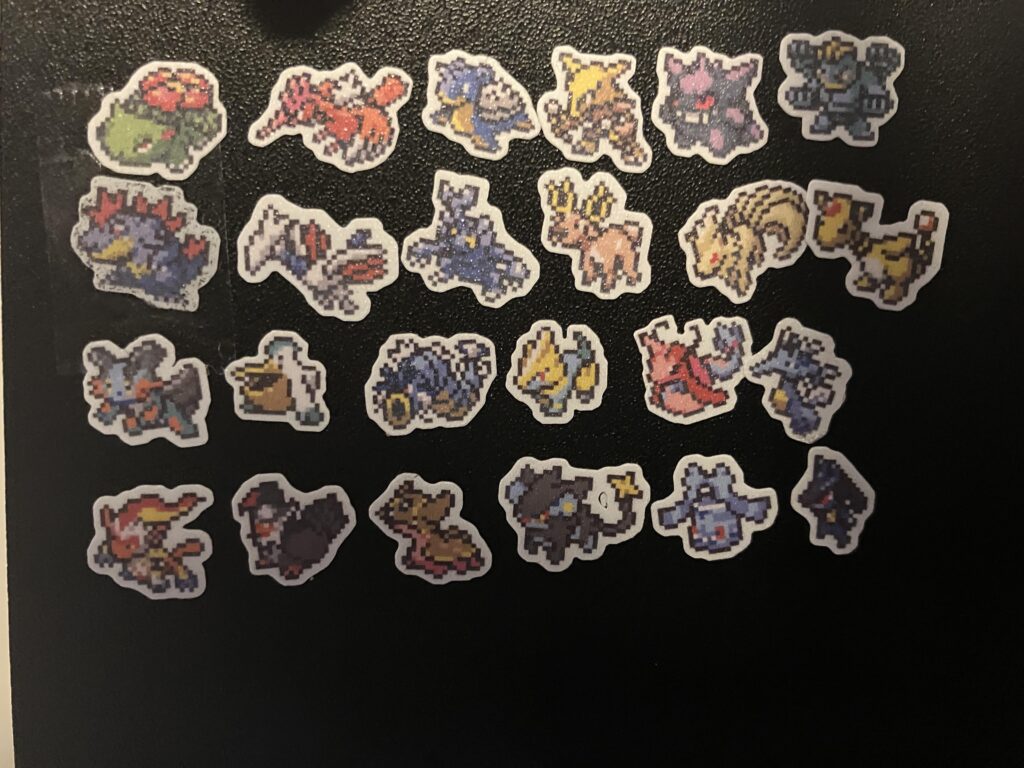 I made a sticker wall of my elite four winning teams