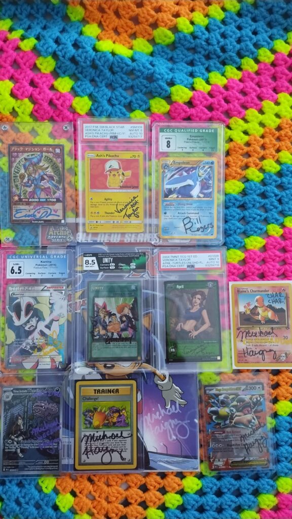These are some of the stuff I had signed by Pokemon voice actors over the years