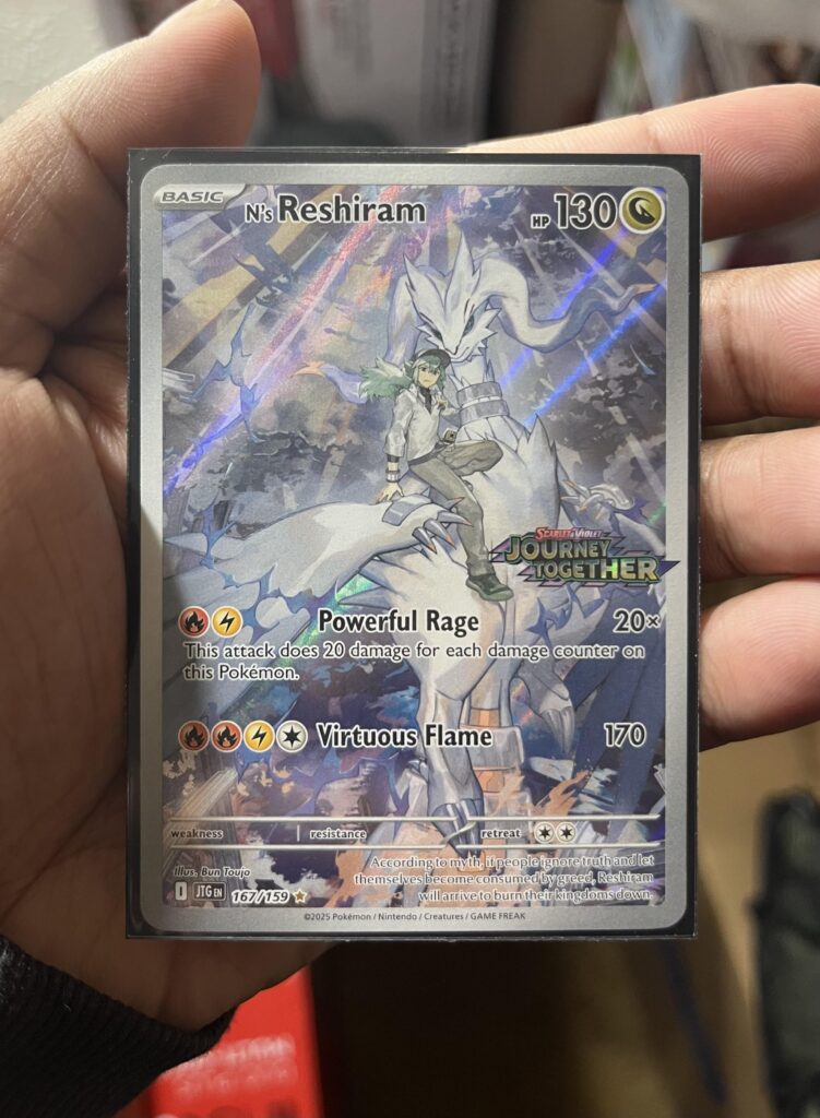 N’s Reshiram card stamped looks so majestic