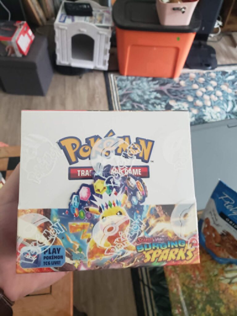 Let's take a break from moving to open 36 packs of Surging Sparks!