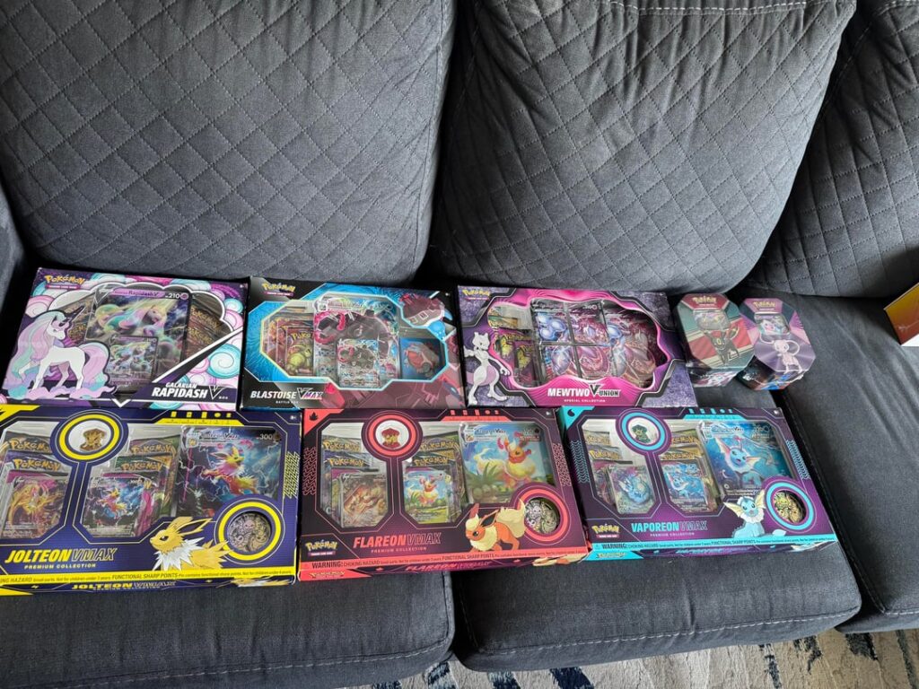 So we went ahead and ripped the first victims of our collection which is the eevee vmax boxes. We only have one proper pull, but she is very happy and that’s all it matters.