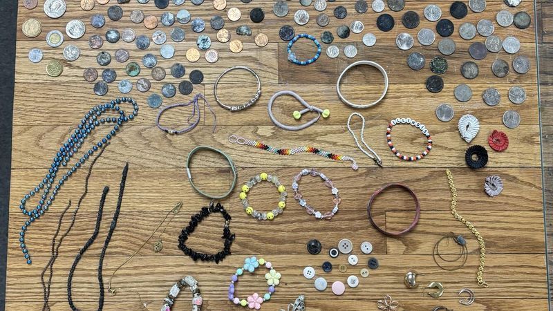 Yellowstone staff collected more than $18 in coins from hydrothermal areas during summer 2026, where they can damage bacterial and algal formations. (Photo: Yellowstone National Park)